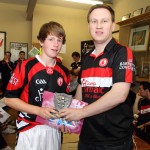 Kevin McConnell receiving the Paddy McIntosh Award from Donal McAnallen