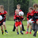 Young lads playing football at Campa Chormaic